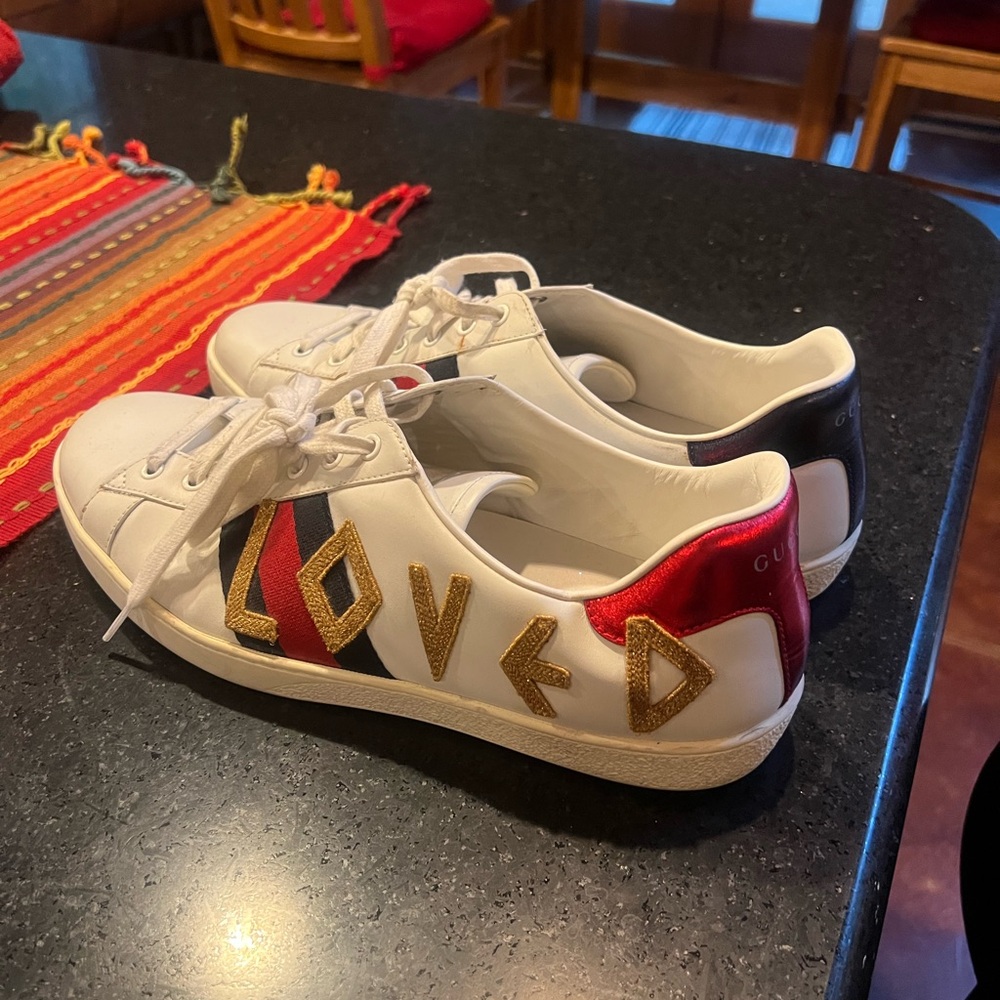 Size US 13 men’s Gucci “love” sneakers